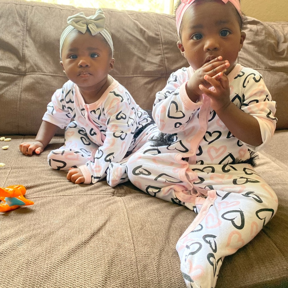 White black and pink onesie with footies